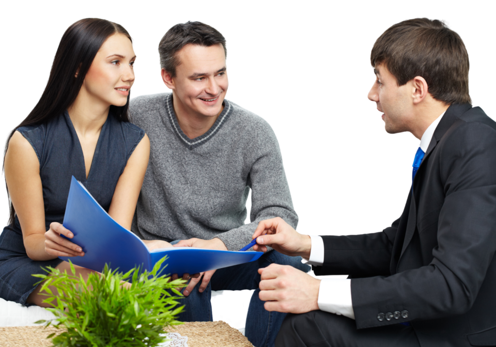 Immigration attorney speaking with clients about obtaining a Green Card